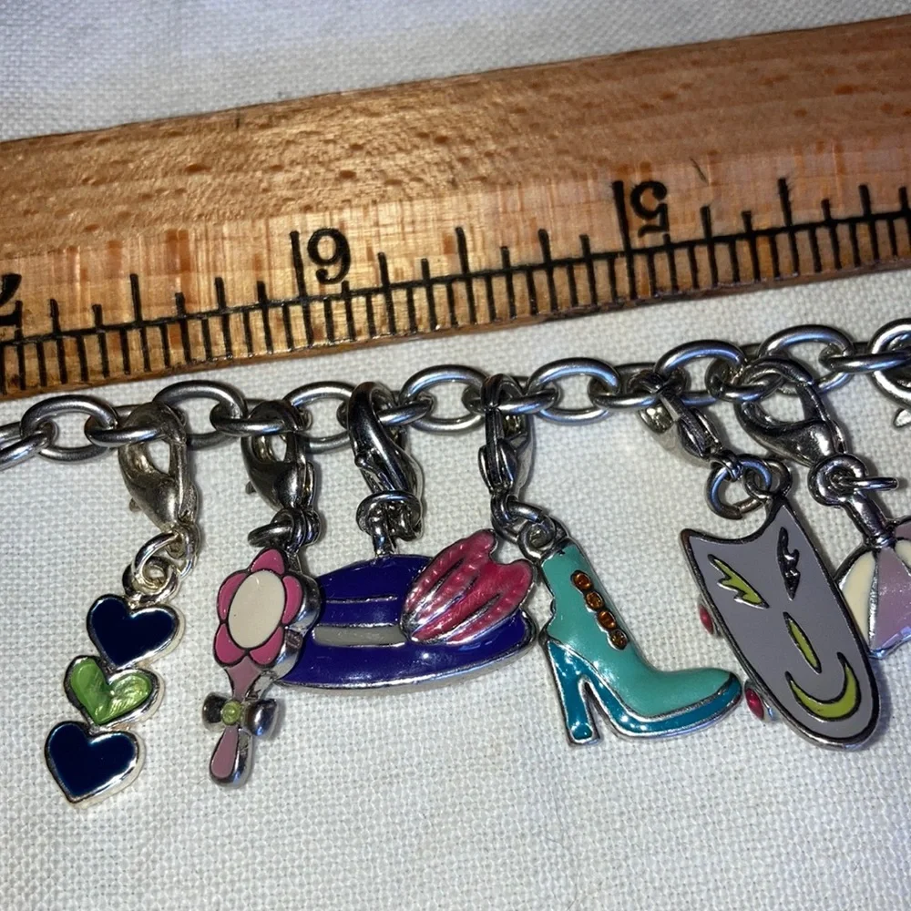 VTG st charm bracelet loaded w/cute bright enameled colors, 8” chain. $45 - Picture 6 of 7